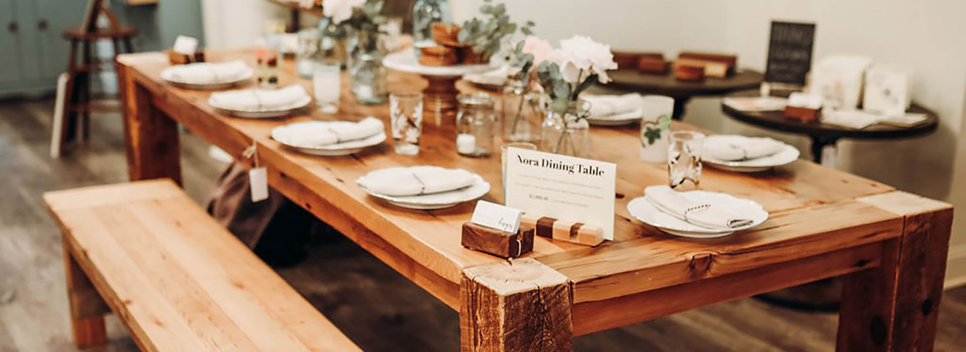 The table and bench, made from a wall stud from another renovation, were crafted by Tom. Photo by Erin Almy Photography