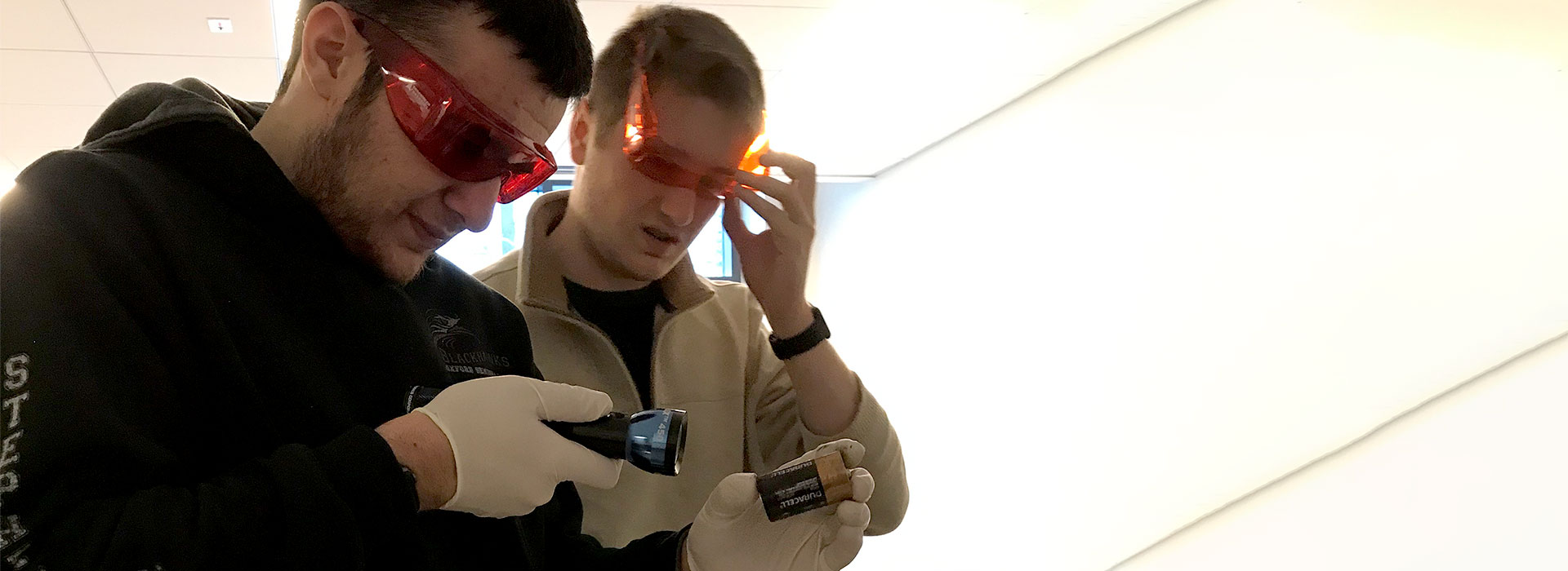 Two criminal justice students investigate a battery.