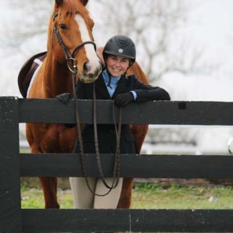 Alumna Rachel Rodriguez and her horse