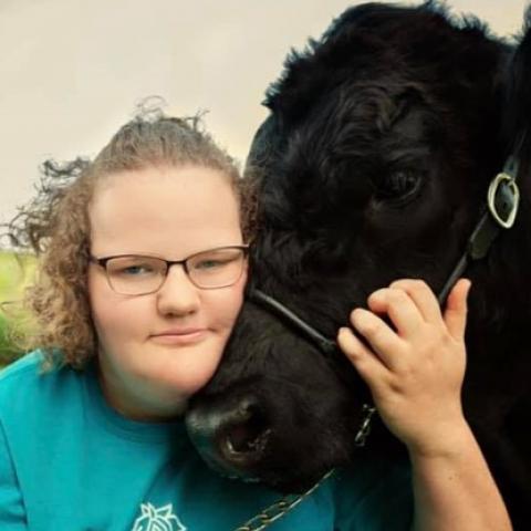 Brittney McElwain and a cow