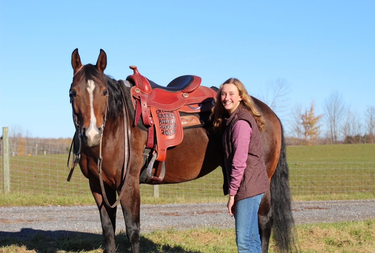 Pictured with her winning saddle is Victoria Epstein and “Lola,” the horse who carried her to her latest win.