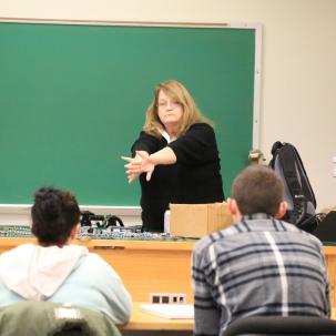 Criminal Justice Professor Claire Armstrong-Seward teaches students in the classroom.